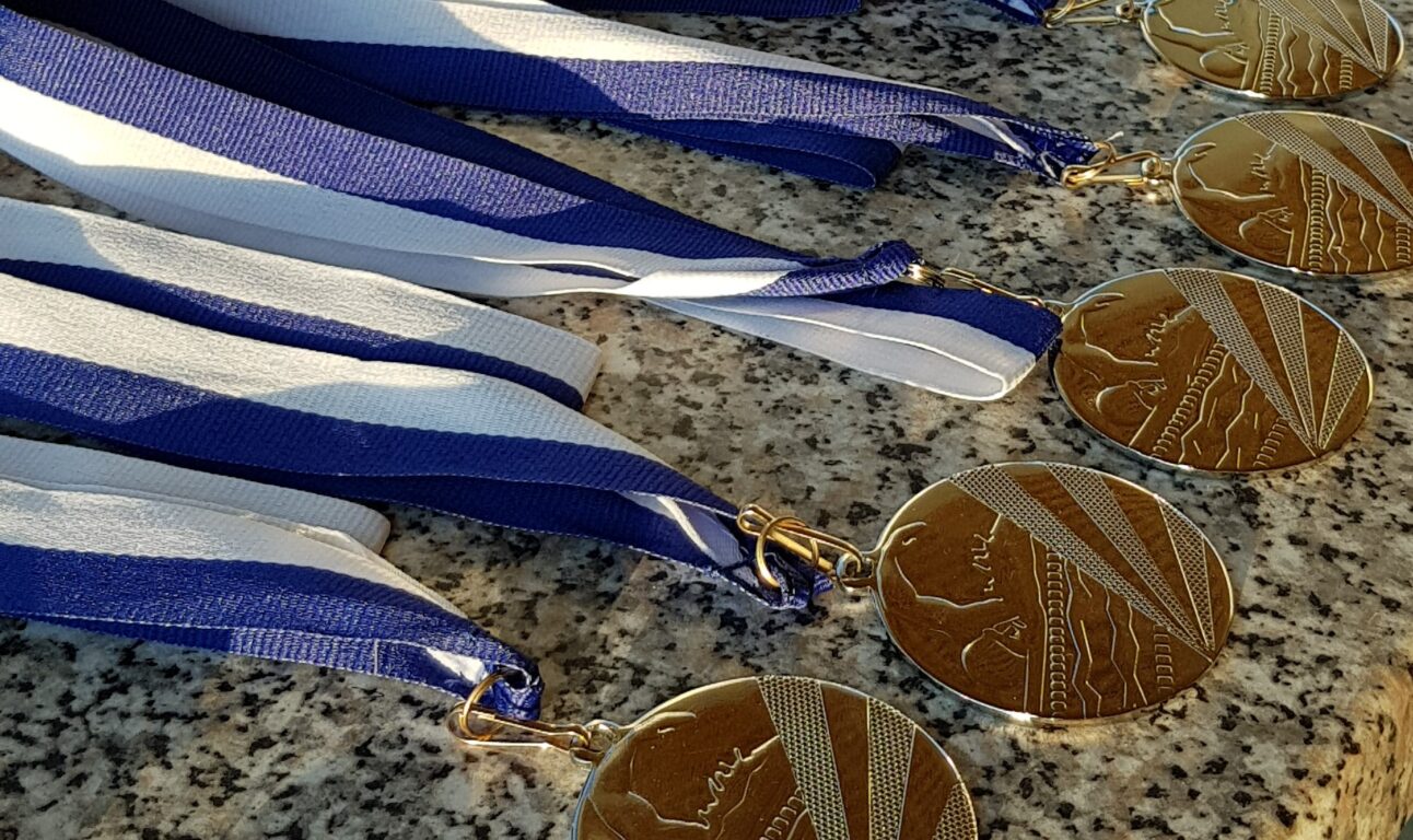 Medaljer på rad_Mitalit rivissä